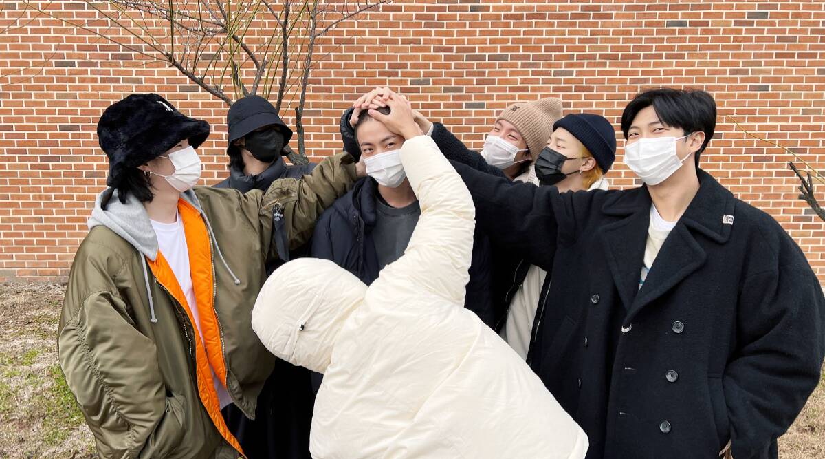 BTS members take one last OT7 photo with Jin at the training camp as he begins military service; V shares tearful tribute: 'Let's not get hurt'. Entertainment News, The Indian Express