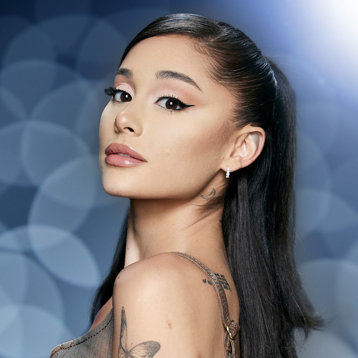 Ariana Grande Goes Vintage With Blonde Pigtails And Bangs For '60s Inspired Photohoot