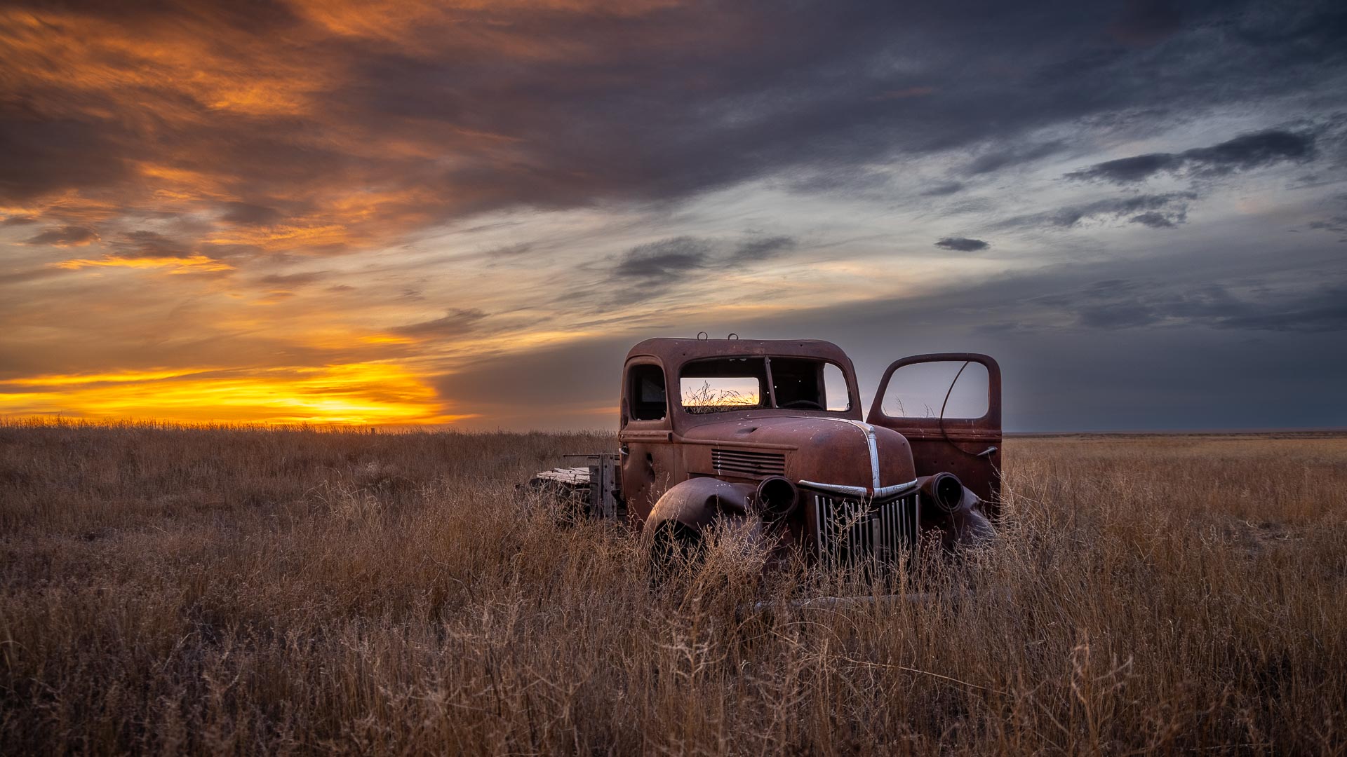Truck in Field April 2022 Free Wallpaper