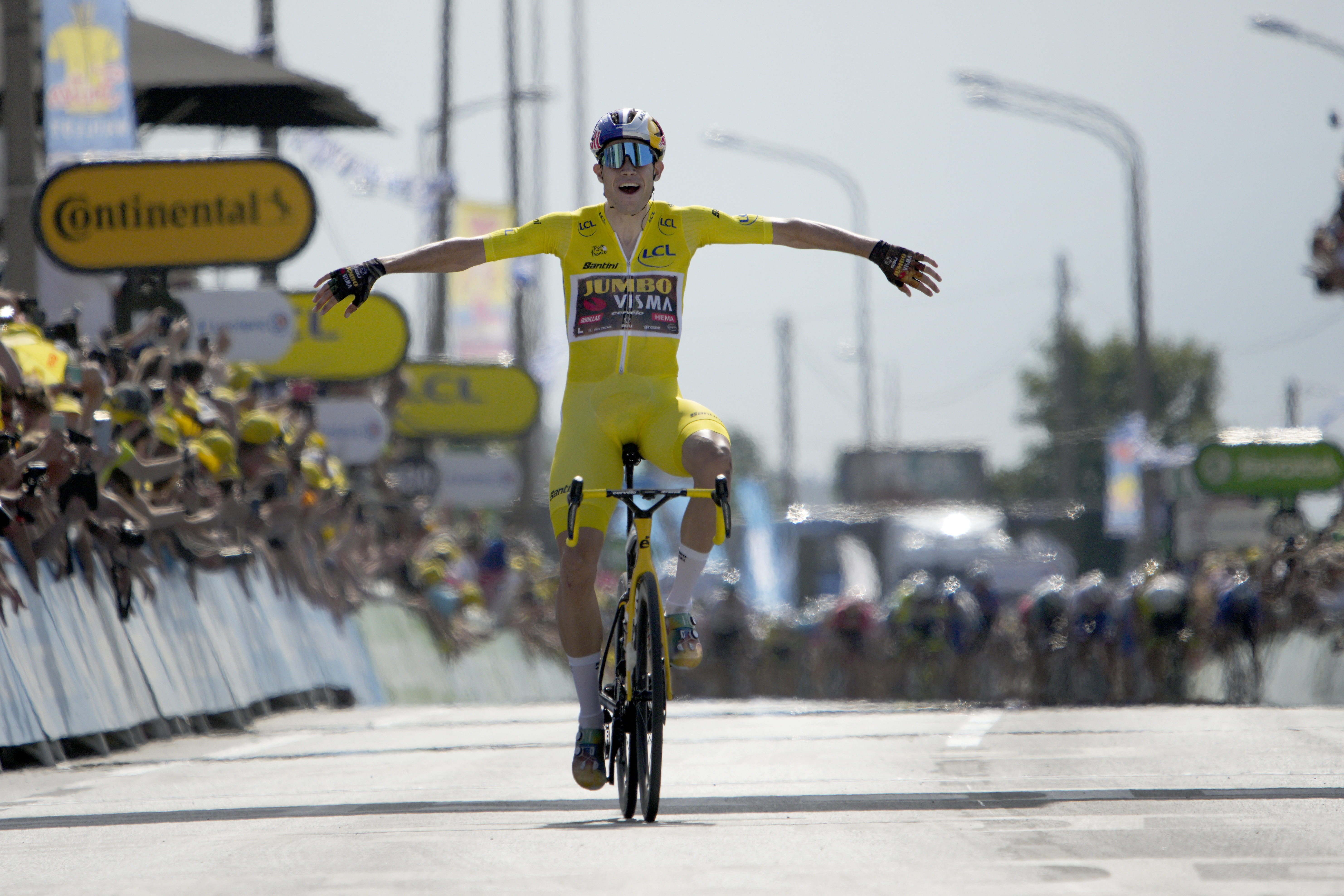 Van Aert wins Tour stage 4 in style and extends overall lead