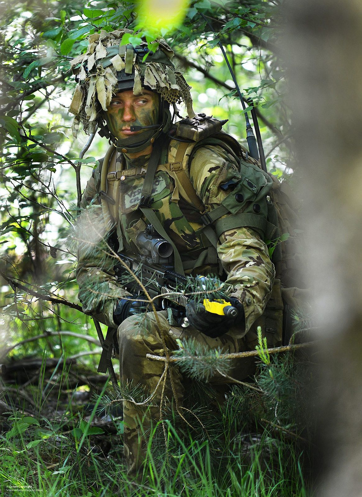 Soldier Wearing Camouflage on Patrol. British armed forces, Royal marine commando, Canadian army
