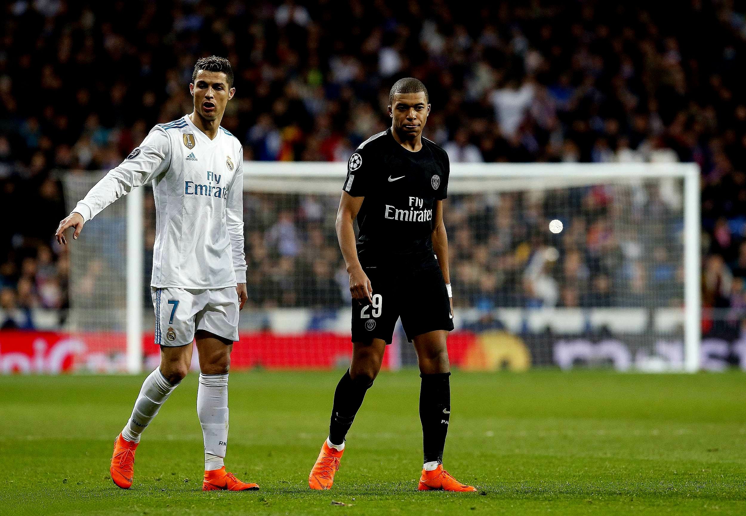 Cristiano Ronaldo And Kylian Mbappé Photo In Moment Of UEFA Champions League. Real Madrid (2 5 On Aggregate) Cha. Cristiano Ronaldo, Ronaldo, Kylian Mbappé
