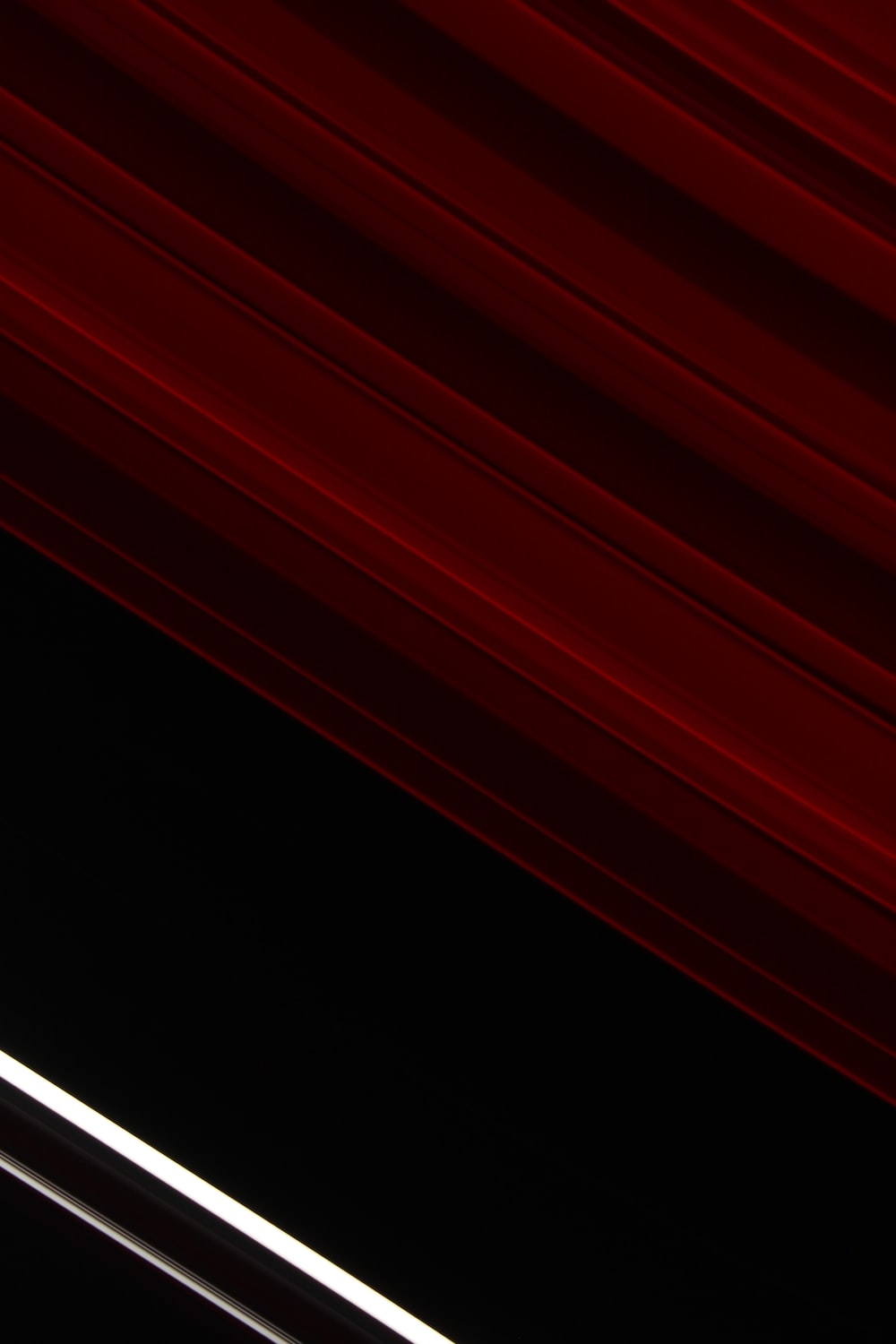 red stripes on a black background photo