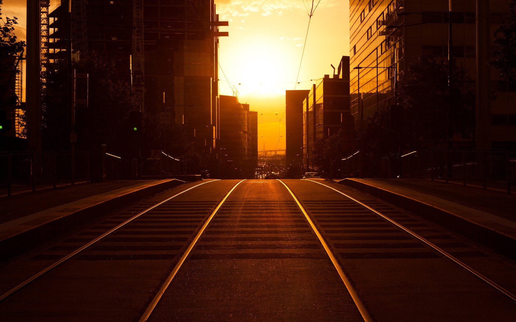 Wallpaper, sunlight, sunset, street, cityscape, night, road, railway, sunrise, evening, morning, bridge, sun rays, dusk, infrastructure, light, dawn, alley, shape, line, darkness, lane, atmospheric phenomenon 1680x1050