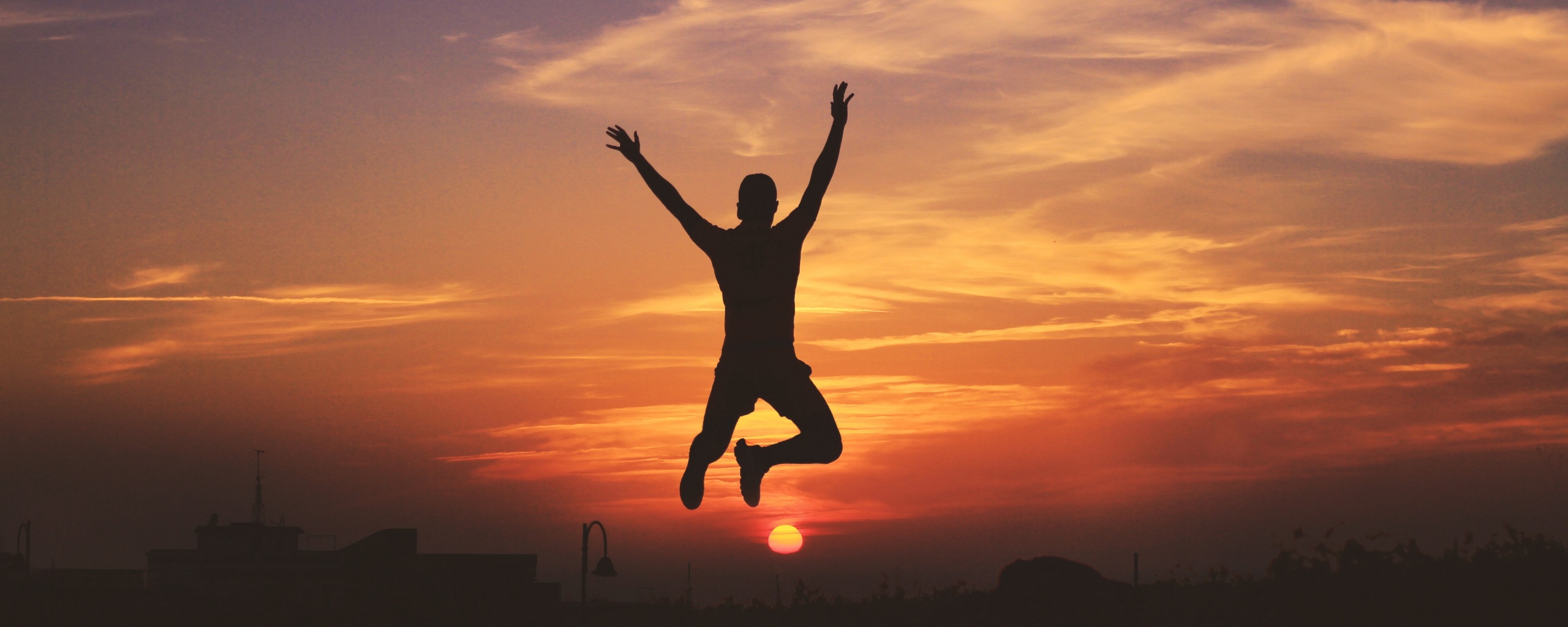 Wallpaper 4k man, silhouette, jump, sky, sunset 4k Wallpaper