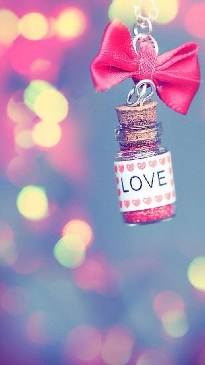 Download Cute Valentine's Day Love Bottle Keychain Wallpaper