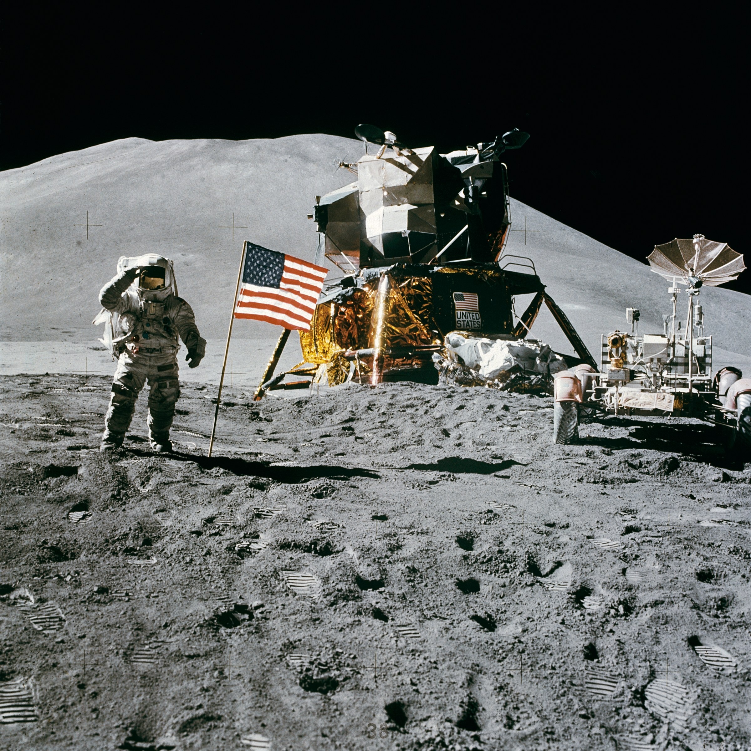 Astronaut Standing Beside American Flag on the Moon · Free