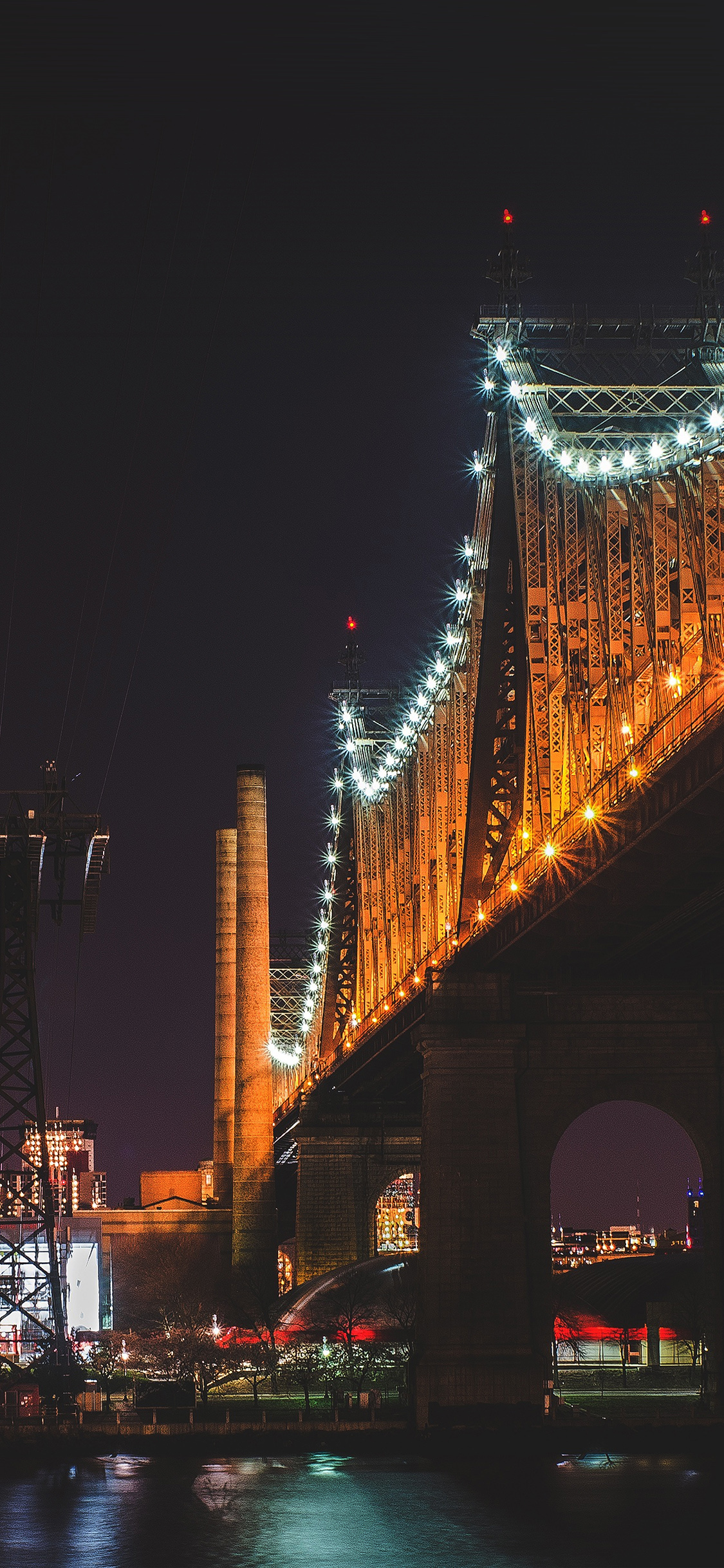 iPhone X wallpaper. bridge night river city lights orange