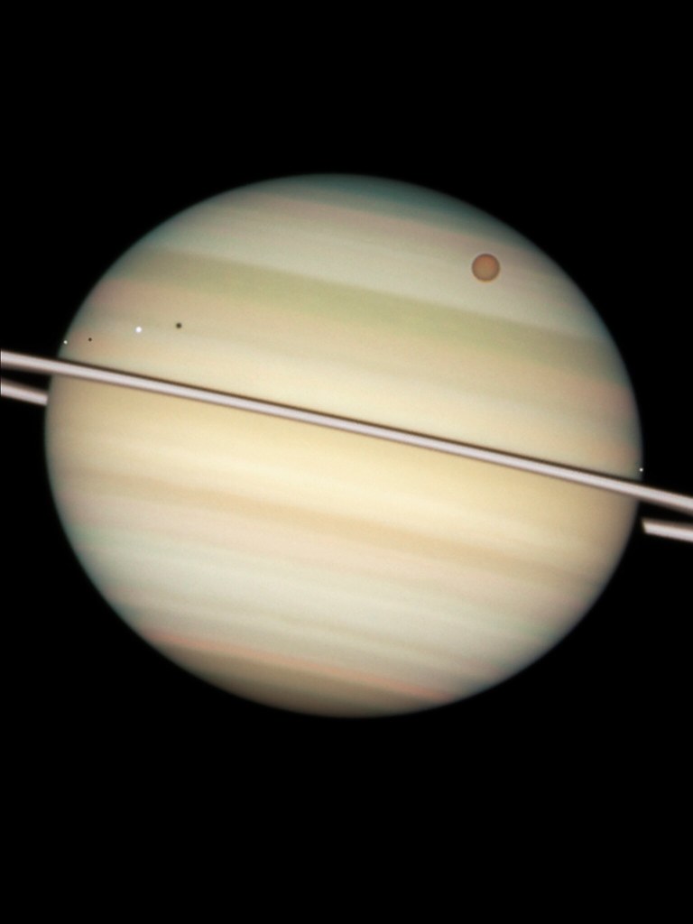 Saturn and Titan Wallpaper. Hubble Space Telescope image of