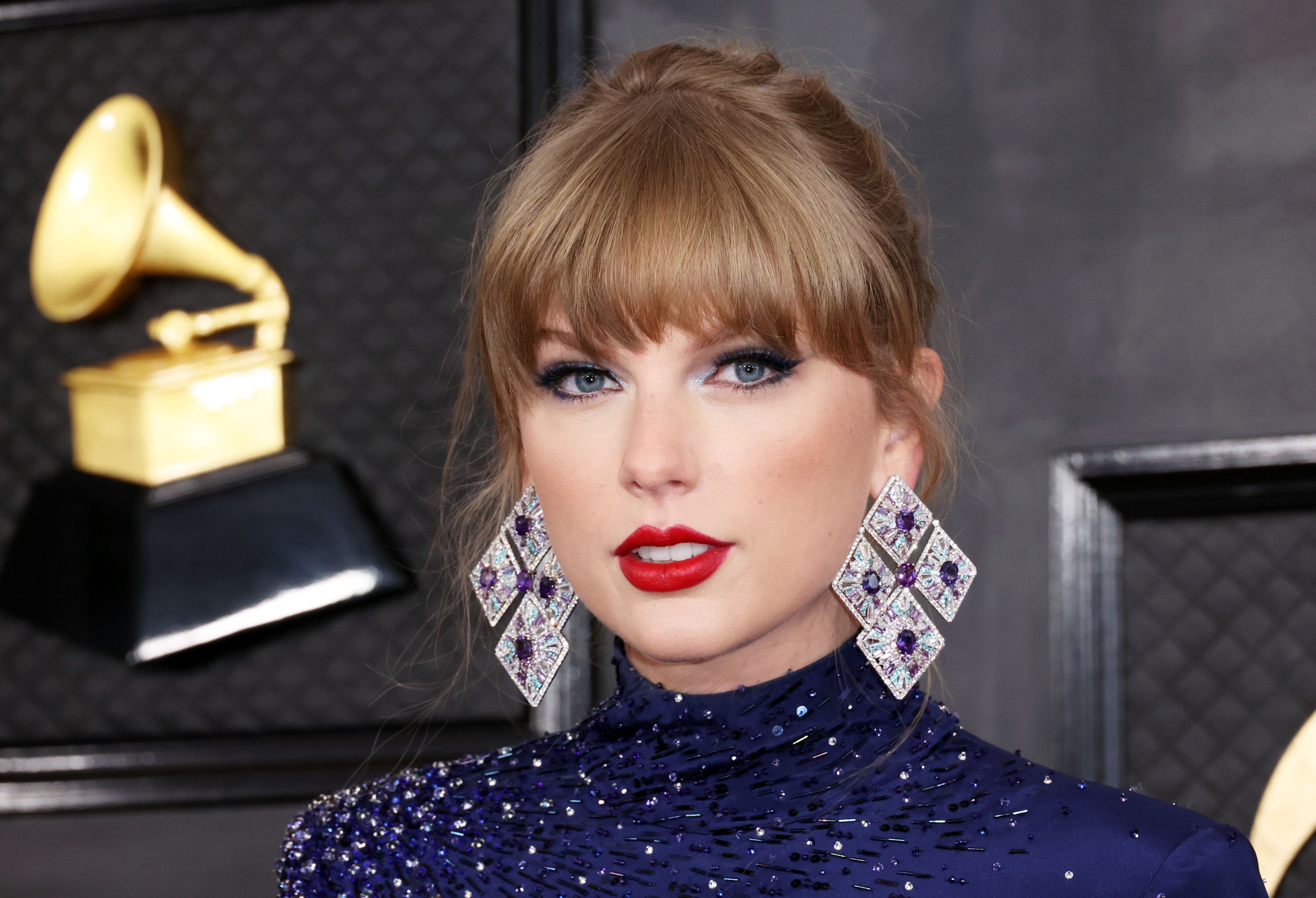 Taylor Swift Hit the Grammys Red Carpet in a 'Midnights'-Inspired Crop Top—See Pics
