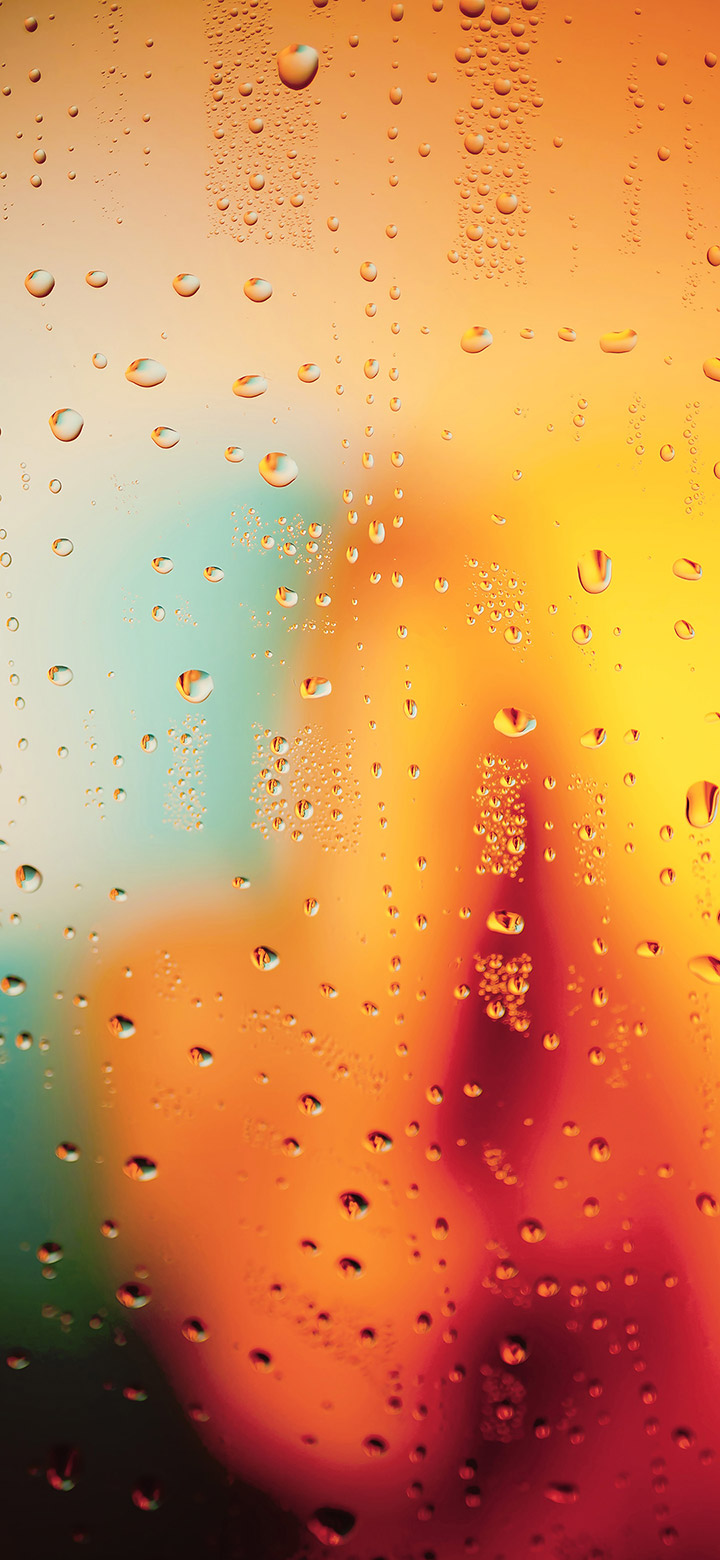 Water Drops On Orange Glass 4K Wallpaper
