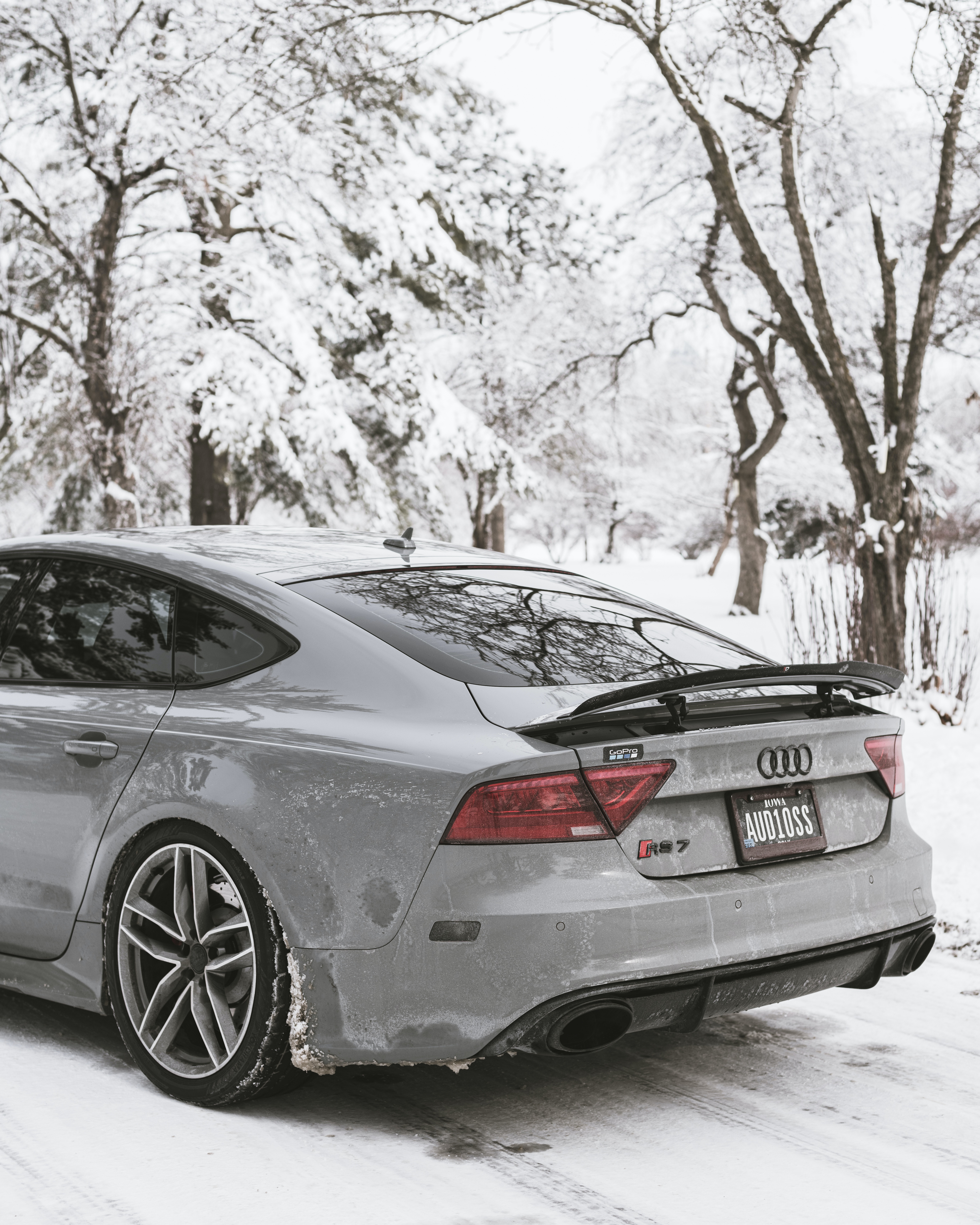 A Gray Audi S7 on a Snow Covered Road · Free