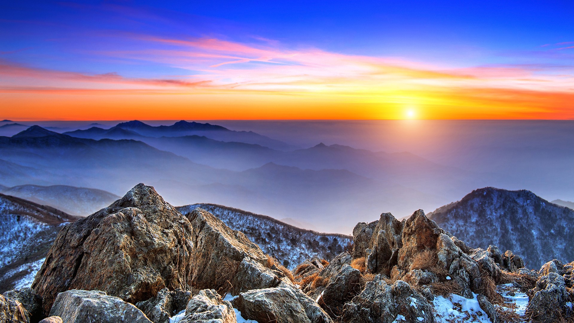 Landscape at sunset in Deogyusan National Park in winter, South Korea. Windows 10 Spotlight Image
