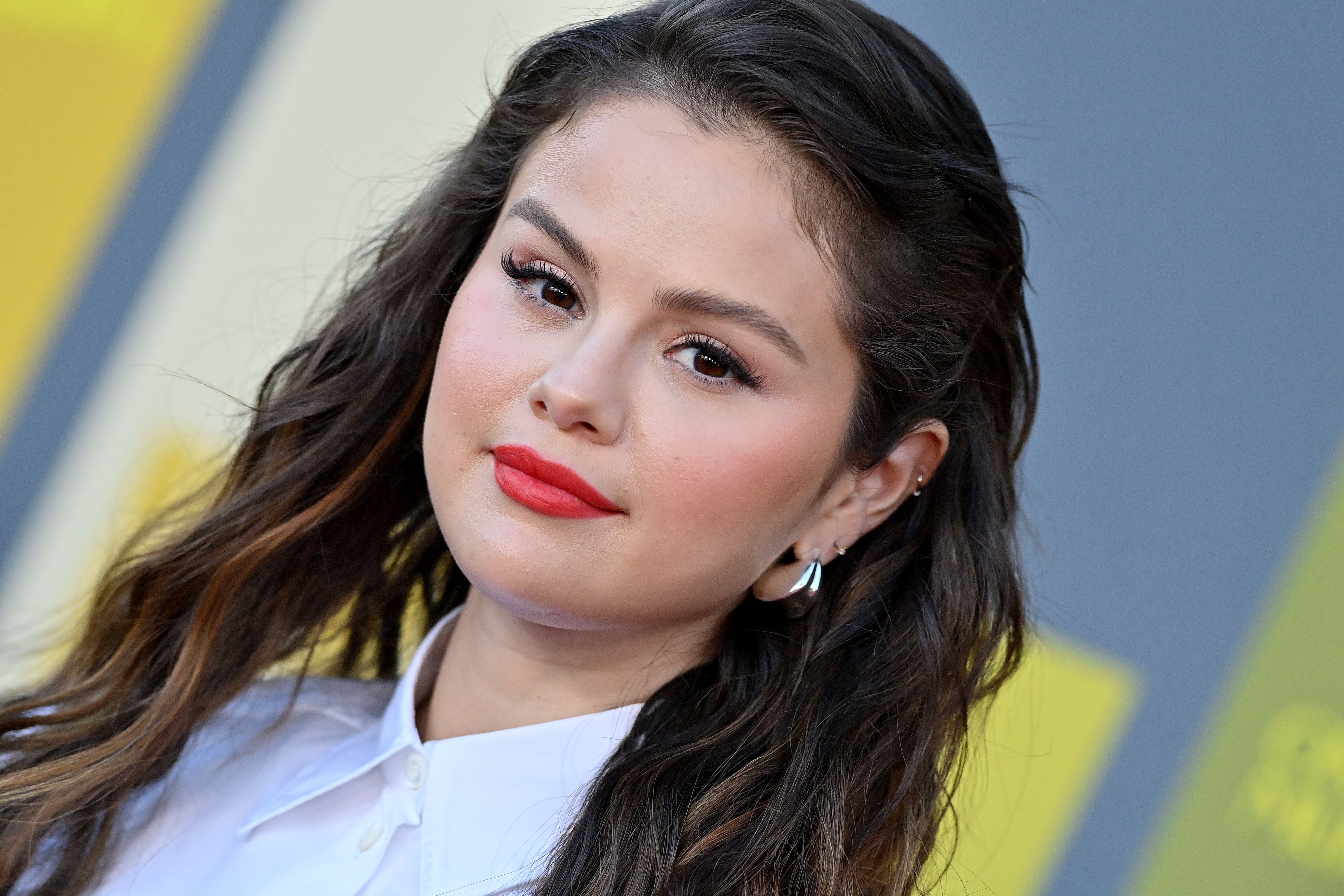 Selena Gomez Had The Perfect Accessory For Her Two Piece Houndstooth 'Fit