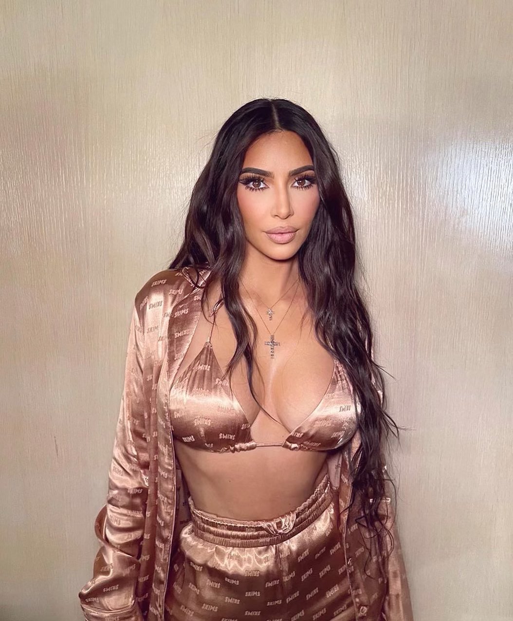 Kim Kardashian wears just a nude silk bra during slumber party with sisters & pals after split from Kanye West