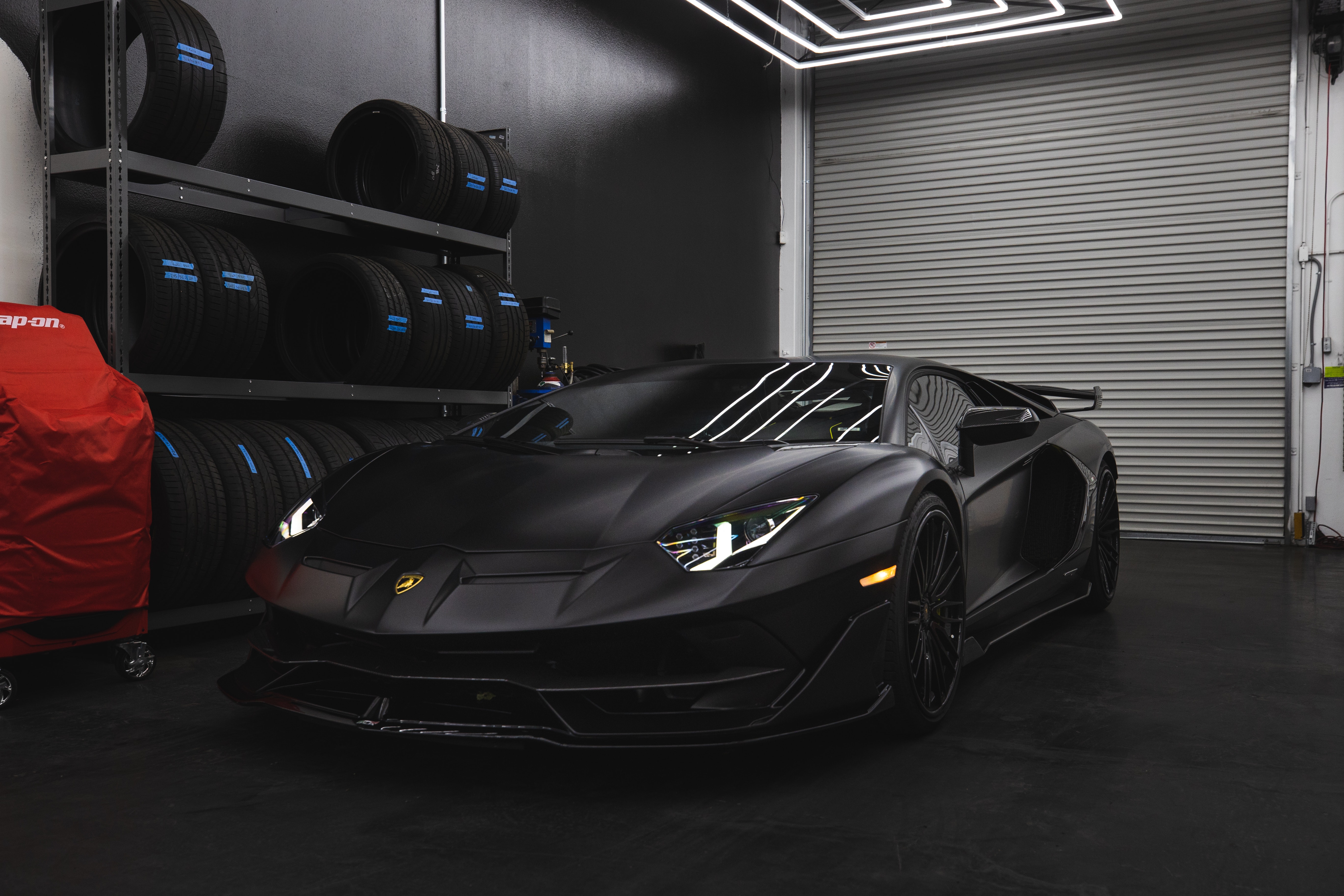 Black Lamborghini Aventador in a Garage · Free