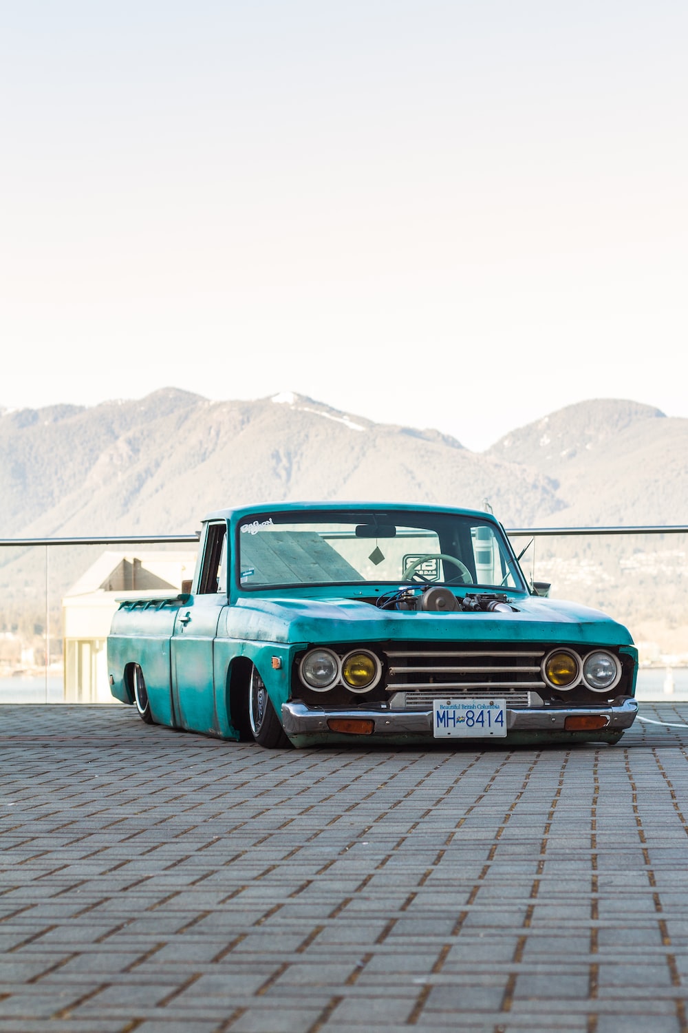 teal single cab pickup truck photo