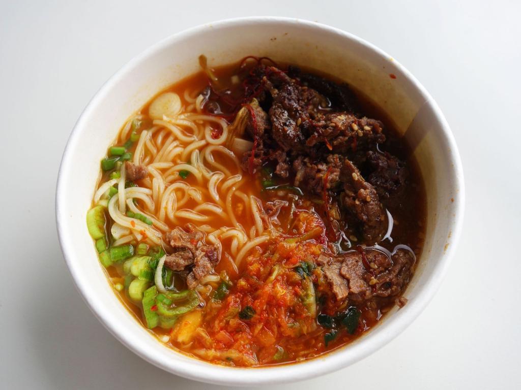 Disney Springs can you find spicy kimchi ramen, fried chicken biscuit sandwiches, and cannoli sundaes all in one place? of course!