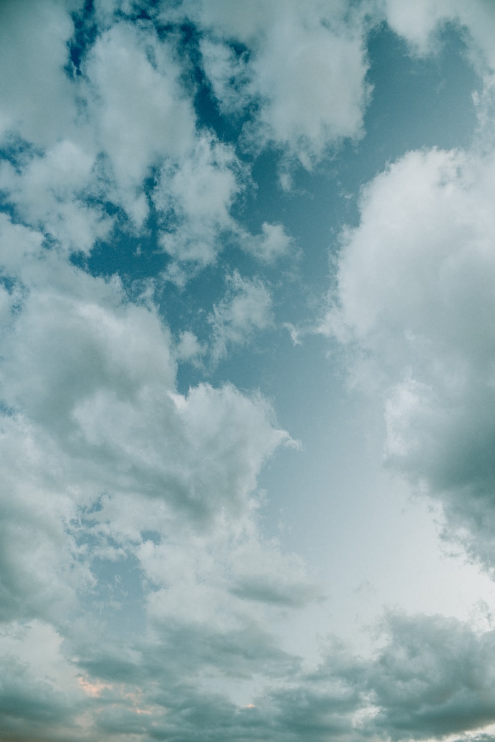 white clouds and blue sky during daytime photo