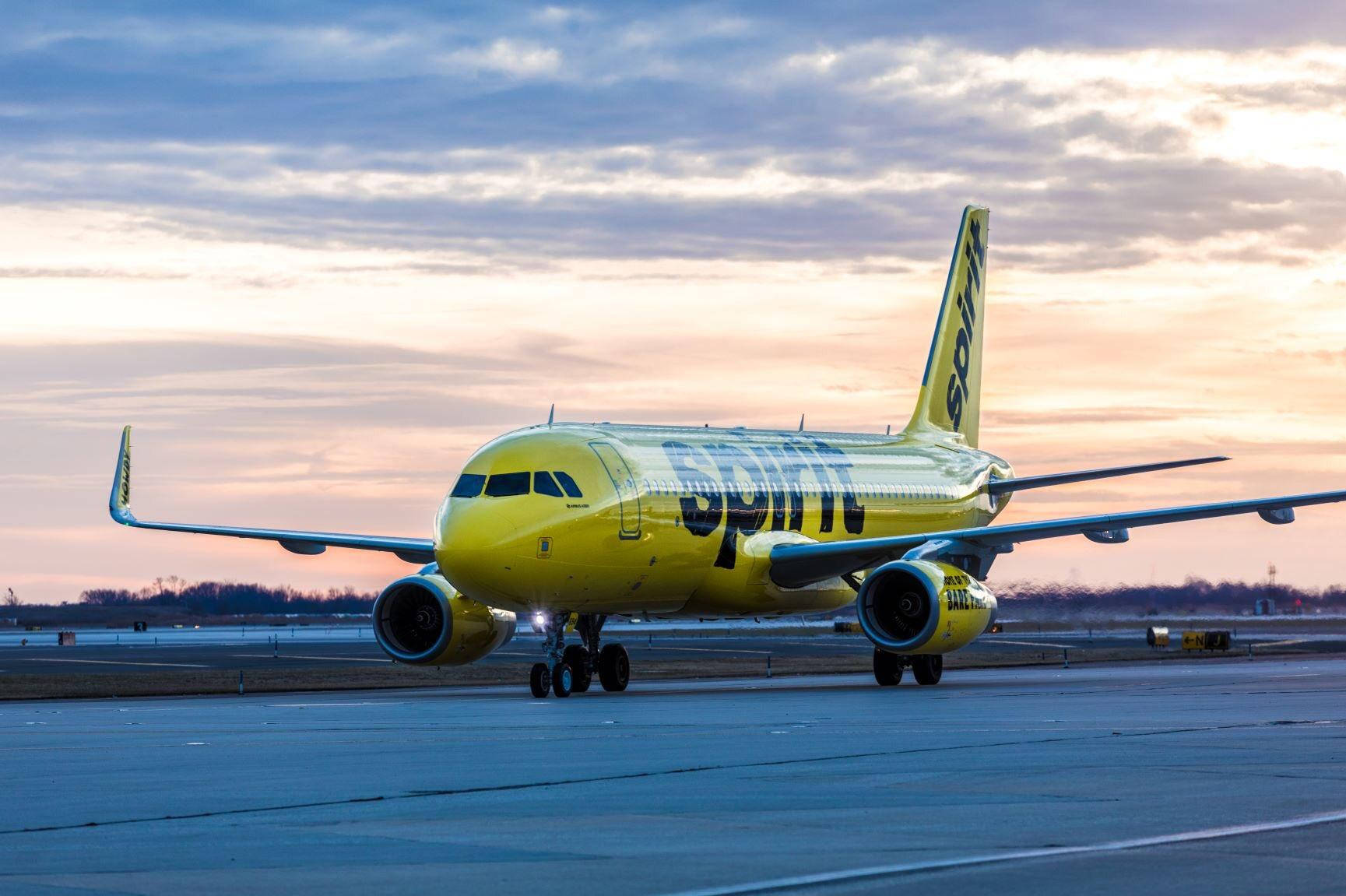 Download Spirit Airlines Airplane On Runway Wallpaper