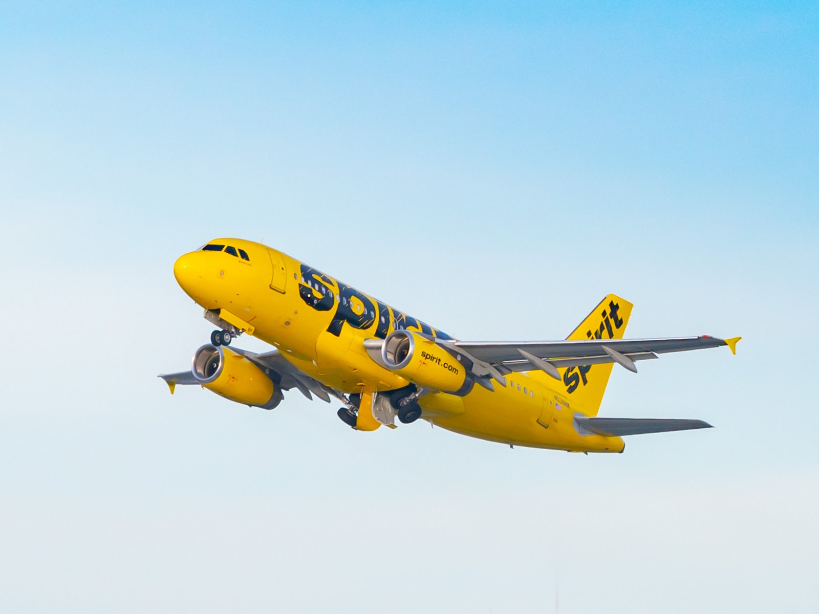 Spirit Airlines Passenger Attempts To Open Emergency Door Mid Flight, Grounds Plane