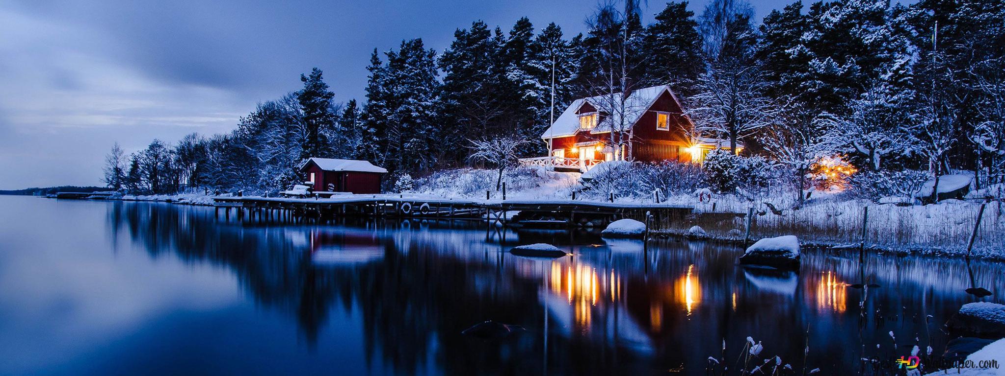 Snowy trees and lonely house reflection in the lake in the dark of night 2K wallpaper download
