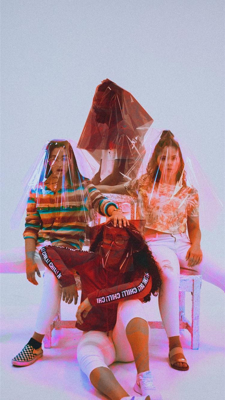 four person sitting on chair with plastic bag cove. iPhone 8 Wallpaper Free Download