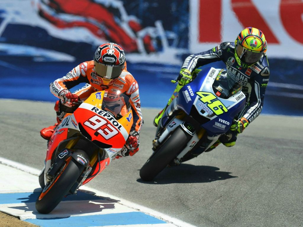 Marc Marquez Vs. Valentino Rossi at Laguna Seca wallpaper in 1024x768 resolution