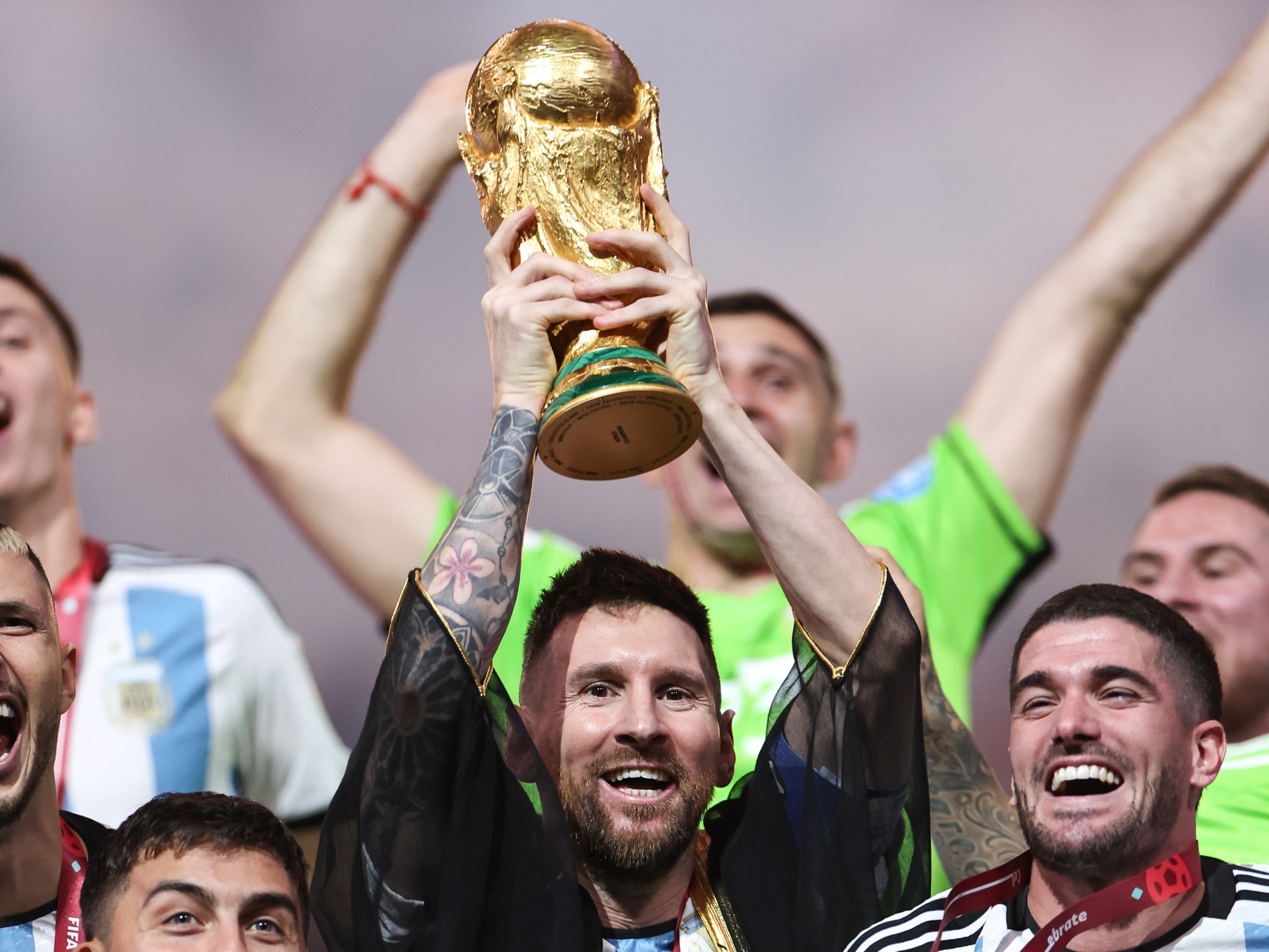 Watch as Lionel Messi dons traditional Arab robe to lift World Cup after Argentina win thrilling final vs France. The US Sun