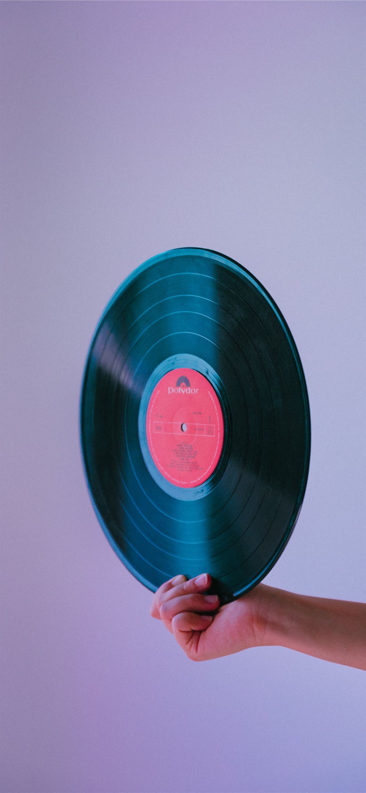 person holding vinyl record iPhone 11 Wallpaper Free Download