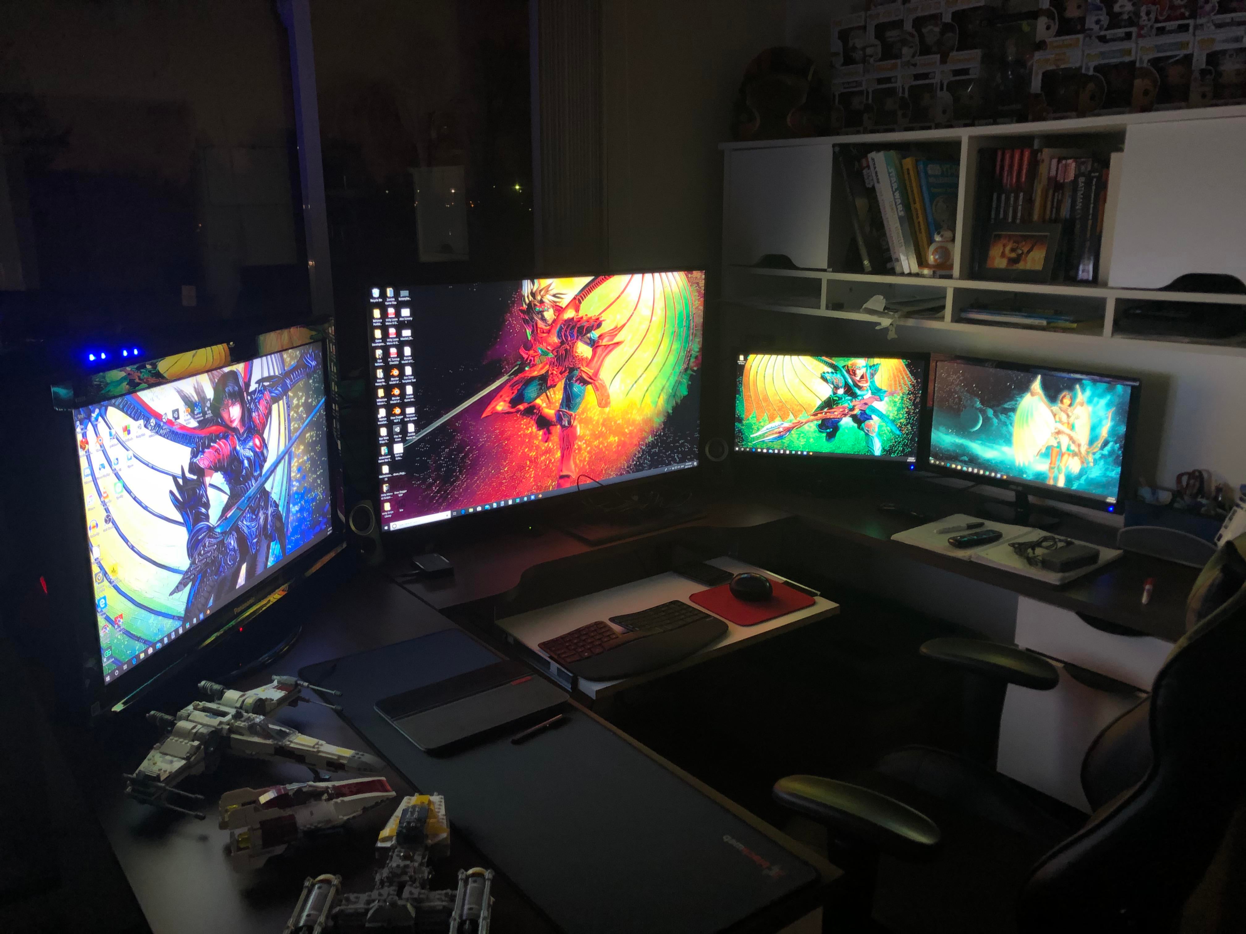 This is my home game dev studio and I wanted to share the wallpaper setup I'm using with you folks! Just noticed that the way the wallpaper are assigned goes in order
