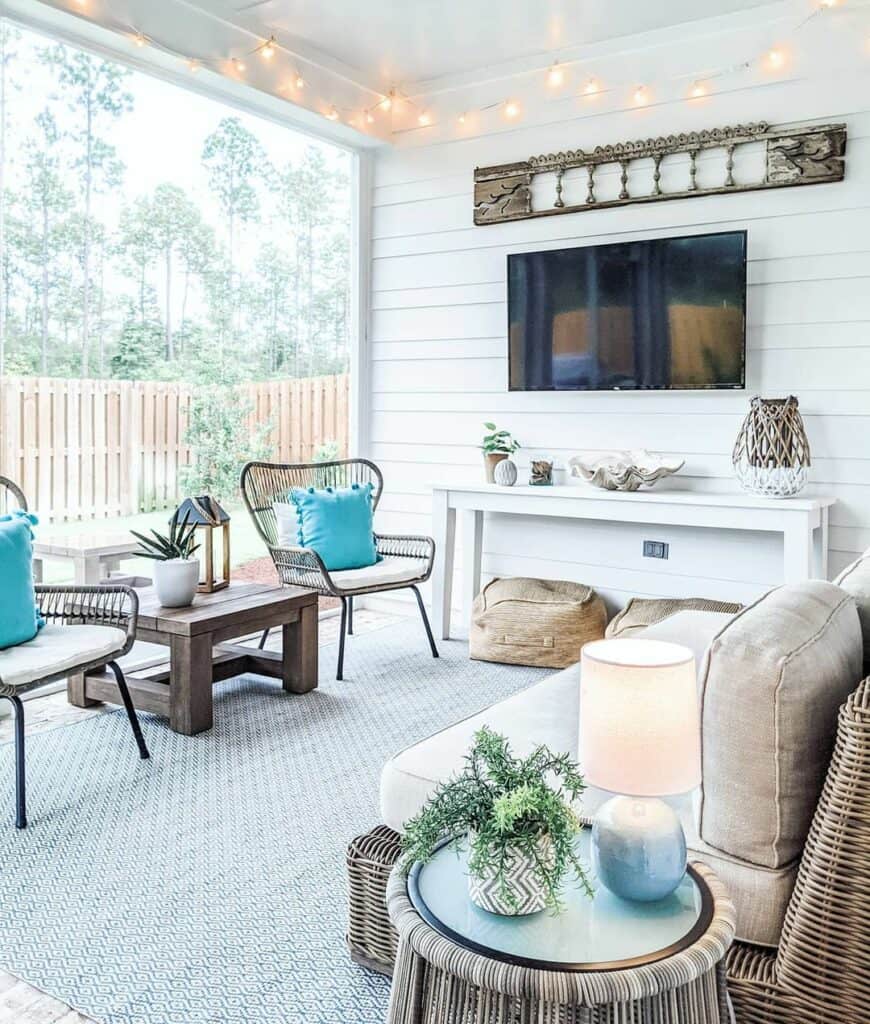 Cozy White Themed Porch With String Lights & Lane
