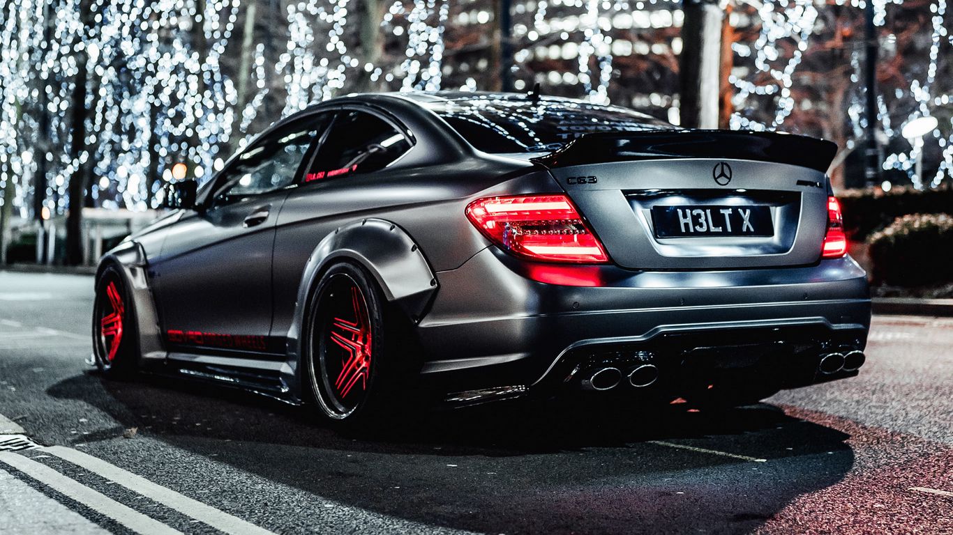 Download Wallpaper 1366x768 Mercedes Benz C63 Amg, Mercedes, Car, Gray, Street, Lights, Christmas Tablet, Laptop HD Background