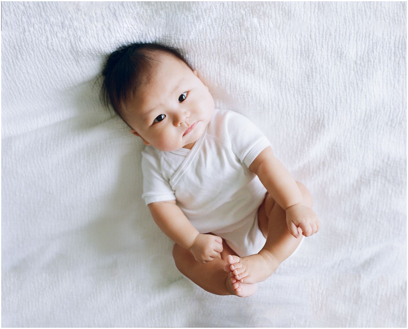 Cute and Chubby Month Old Baby Photo with a French Bulldog. Miriam Dubinsky Photography Lifestyle and Newborn Photographer NJ / NYC