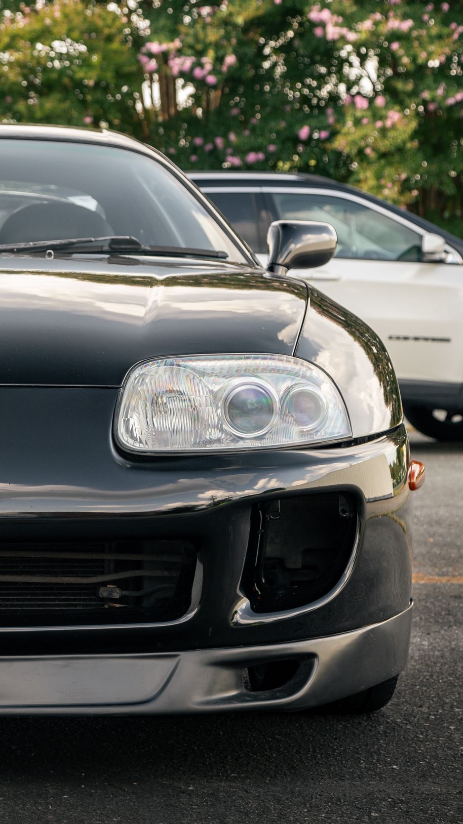 Download Wallpaper 938x1668 Toyota Supra, Toyota, Car, Black, Front View Iphone 8 7 6s 6 For Parallax HD Background