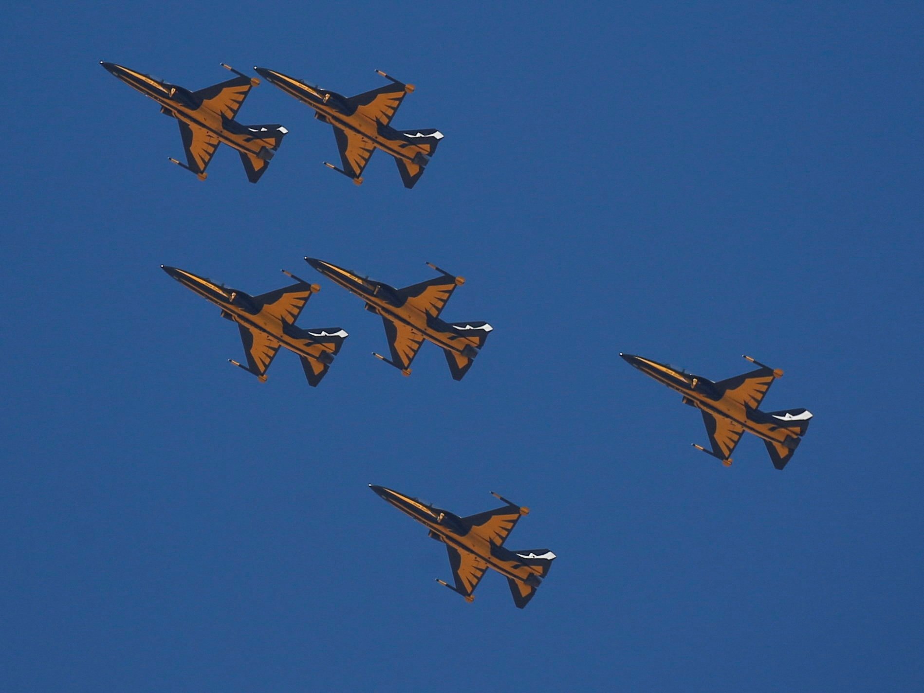 Air show at Egyptian Pyramids plateau adorns sky