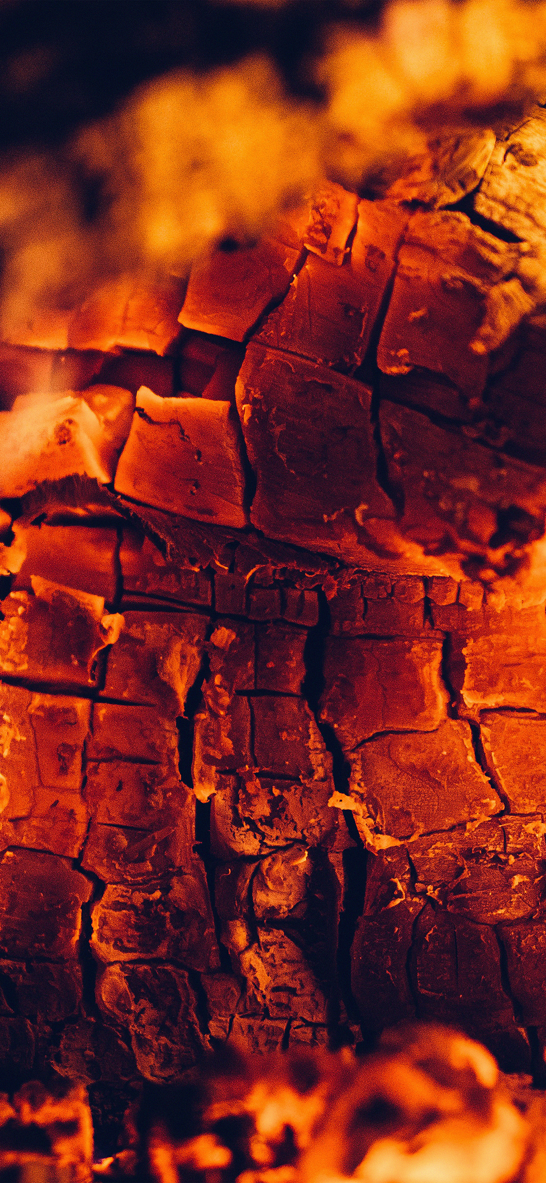 iPhone X wallpaper. fire wood red dark camping