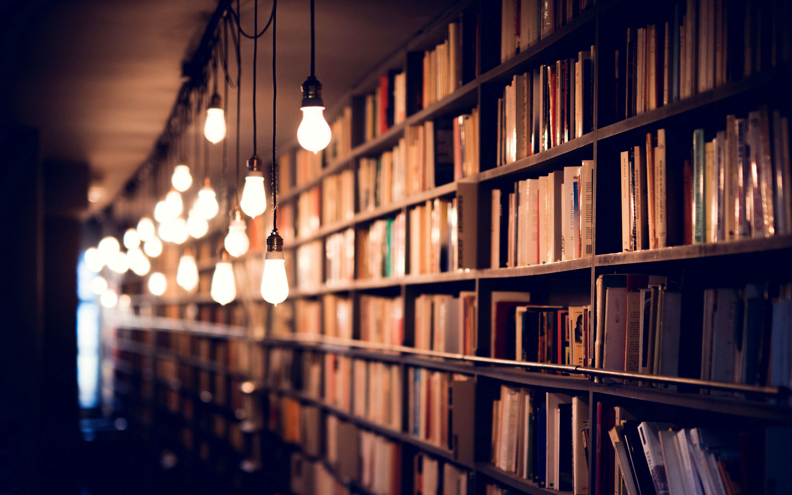 Download wallpaper 2560x1600 books, library, shelves, lighting widescreen 16:10 HD background