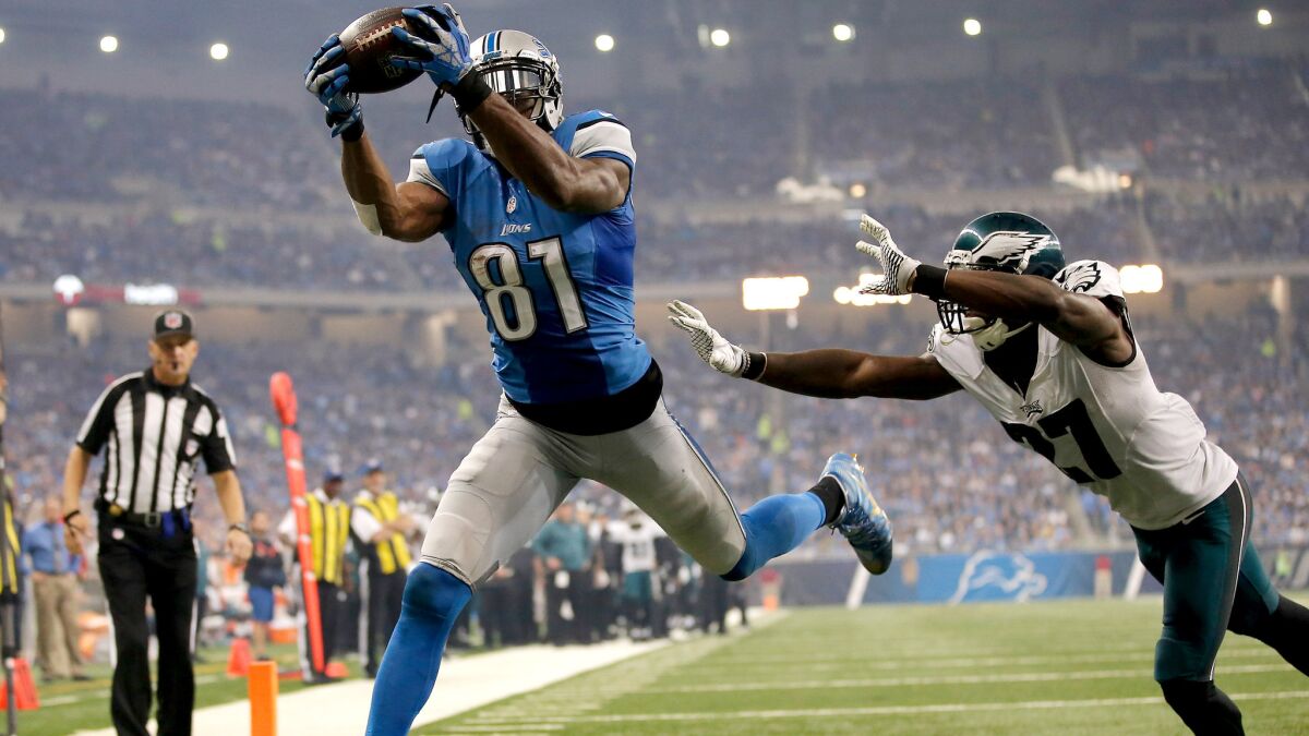 Matthew Stafford And Calvin Johnson Lead Lions To 45 14 Rout Of Eagles Angeles Times