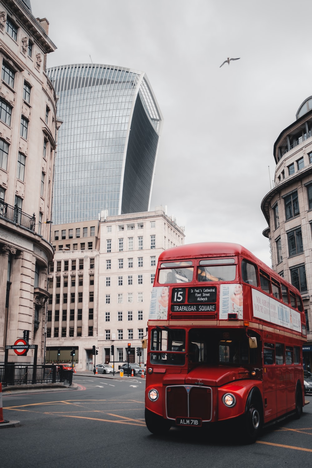 Red Double Decker Bus Near Building Photo