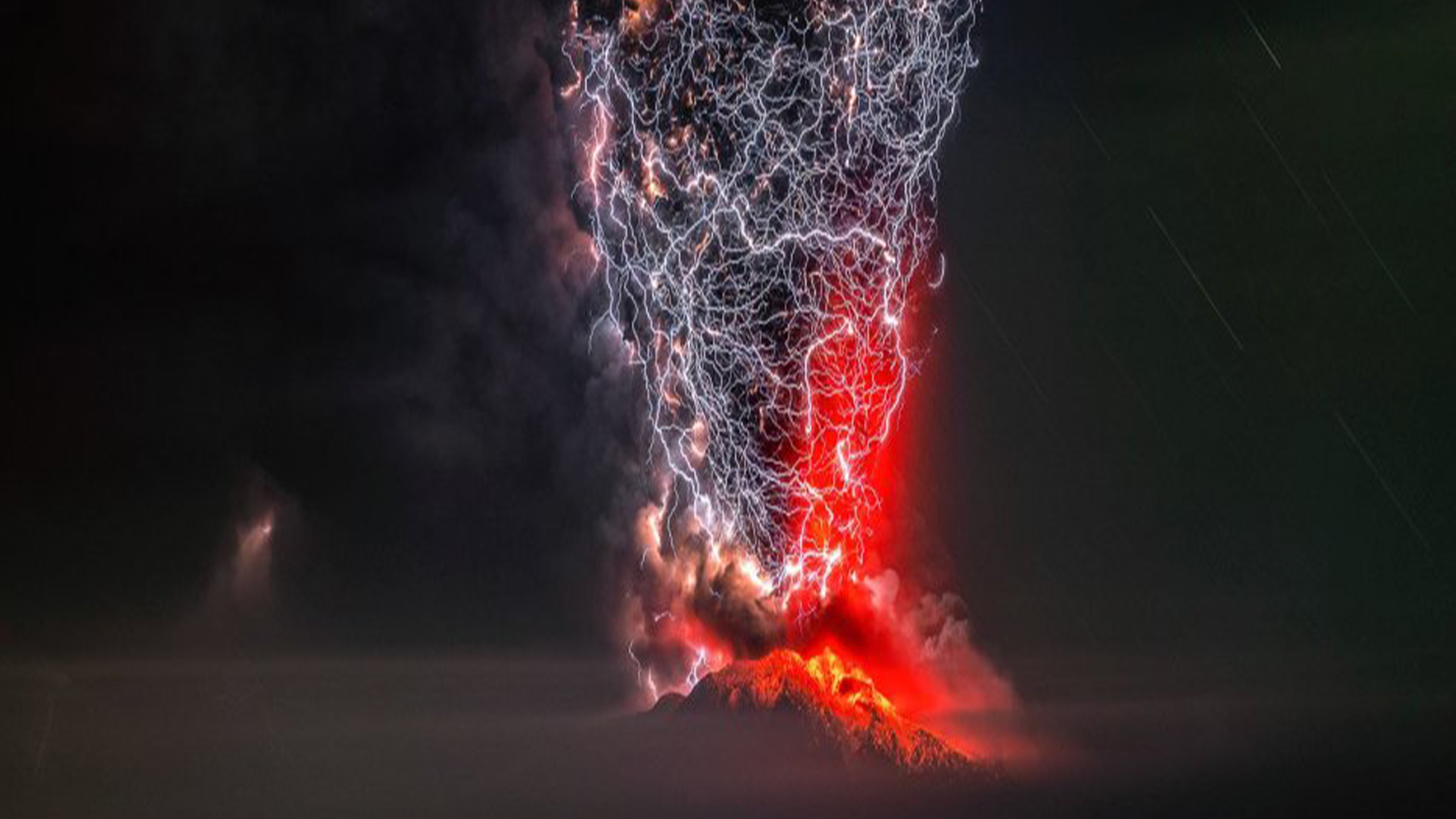 Unbelievable pic of lightning merging with erupting volcano wins 'Perfect Moment' photo contest