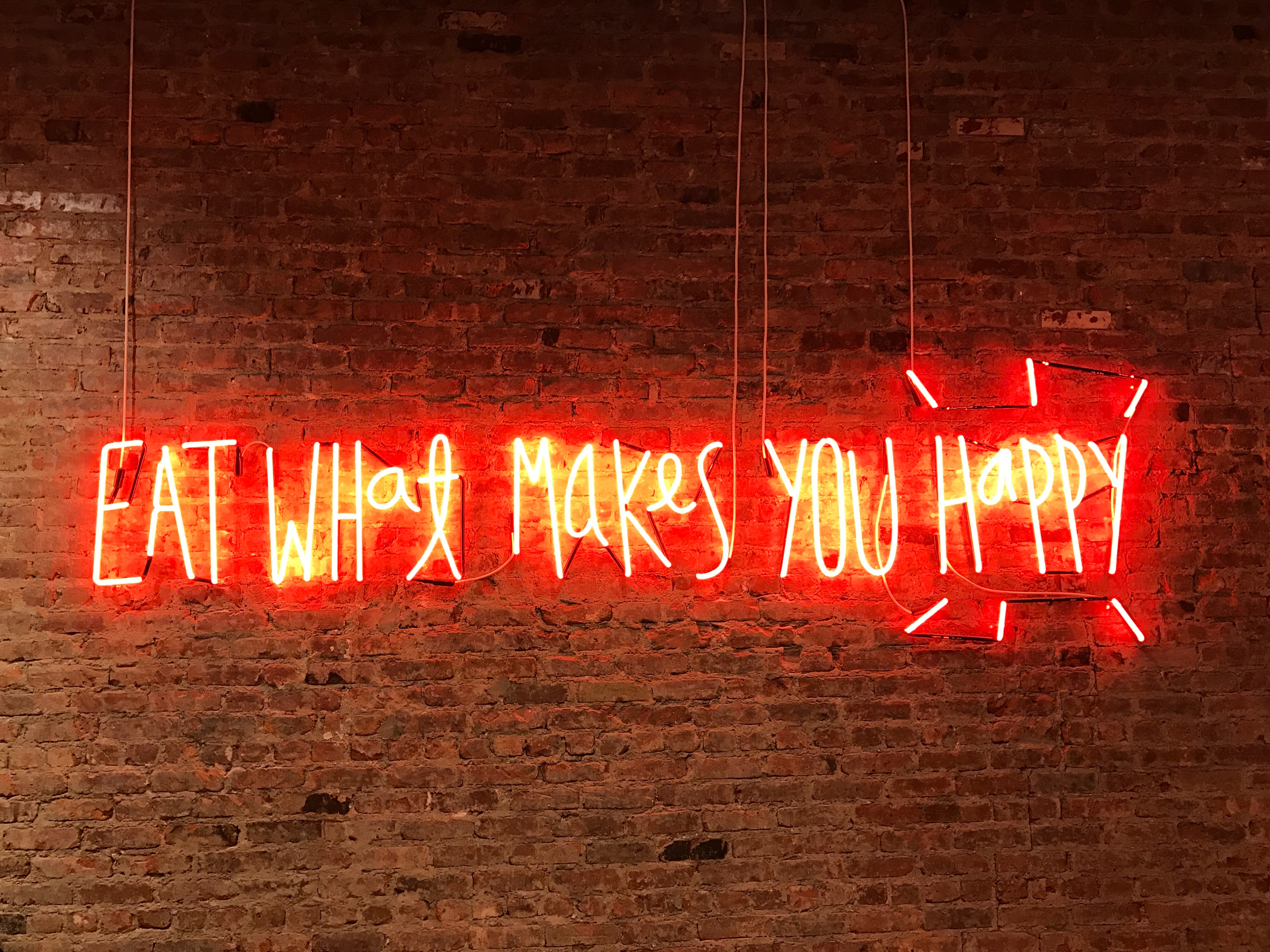 4032x3024 brick wall, words, background, neon sign, brick, PNG image, red neon, sign, eat what makes you happy, typography Gallery HD Wallpaper