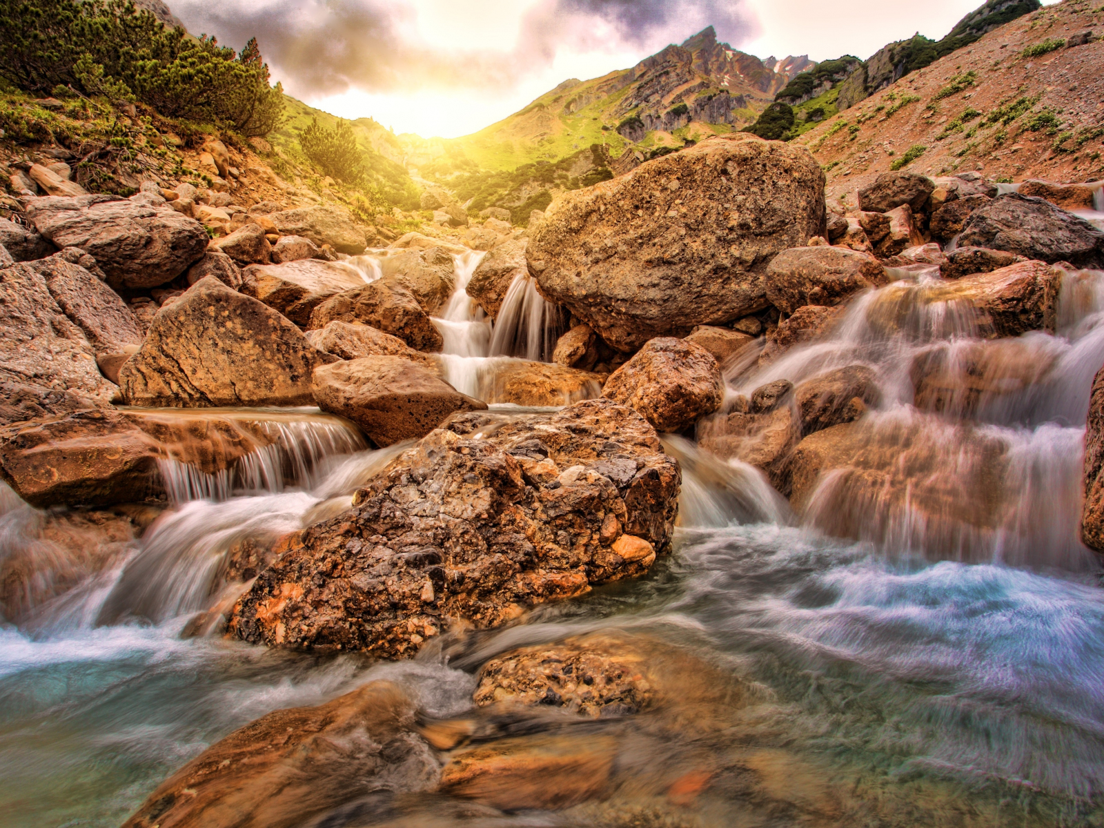 Download wallpaper 1600x1200 waterfall, rocks, sunlight, water stream, austria, standard 4:3 fullscreen 1600x1200 HD background, 18358