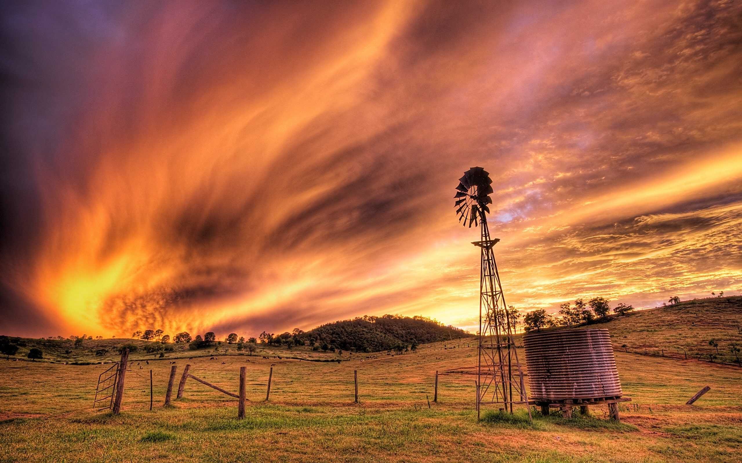 Download Enjoy the Sunset from a Country Road Wallpaper | Wallpapers.com