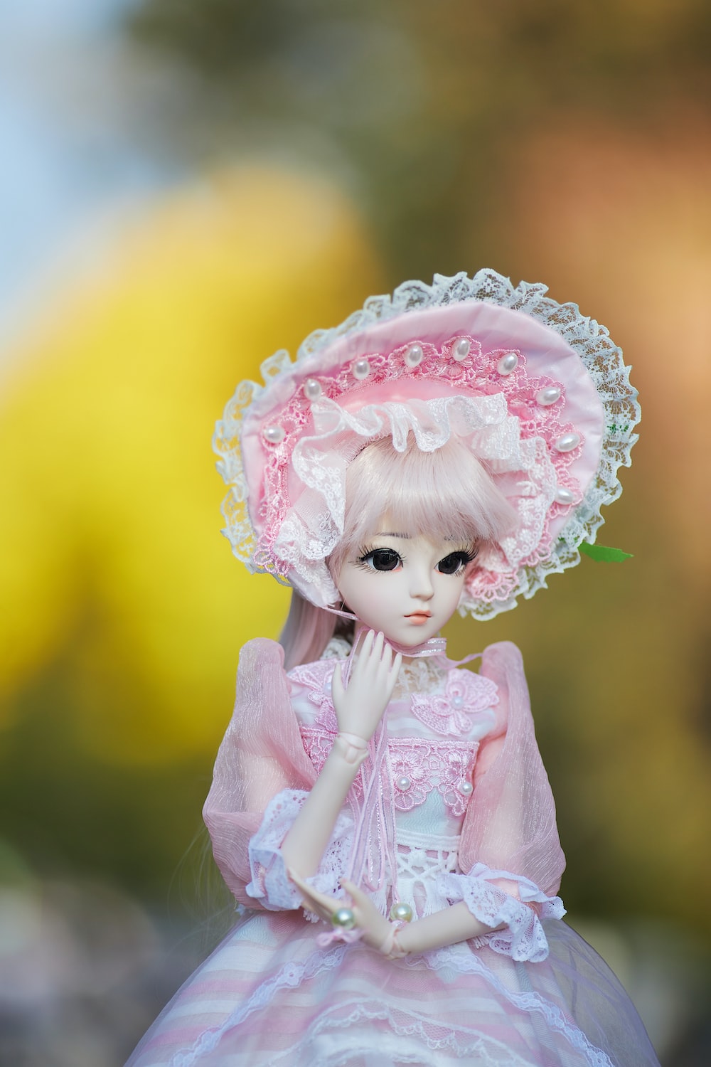 girl in pink dress doll photo