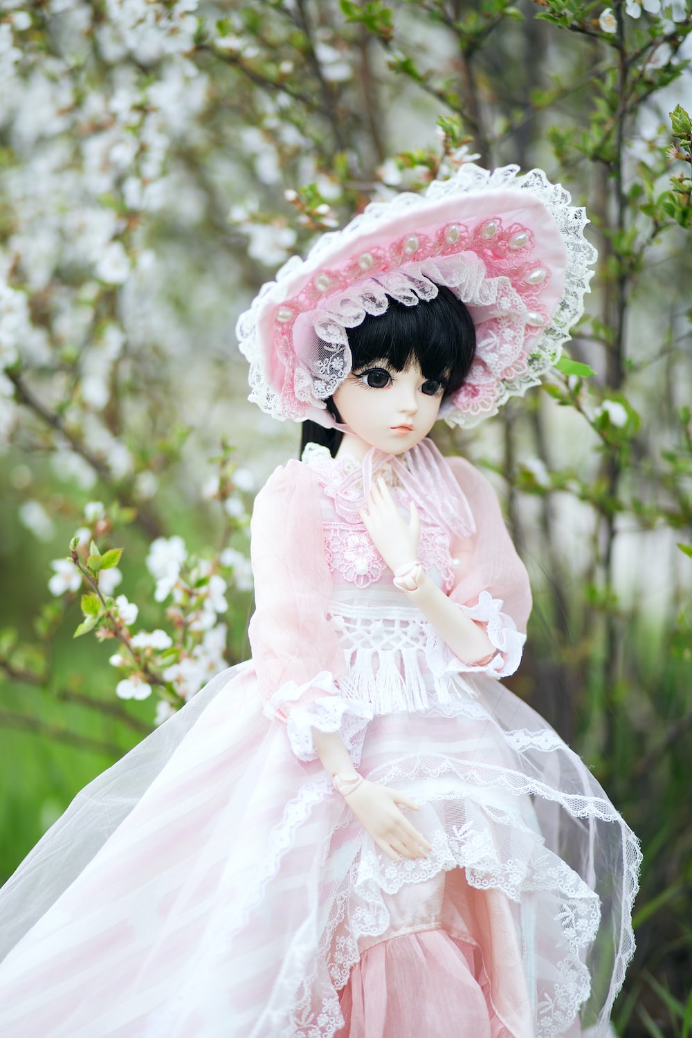 girl in pink dress doll photo