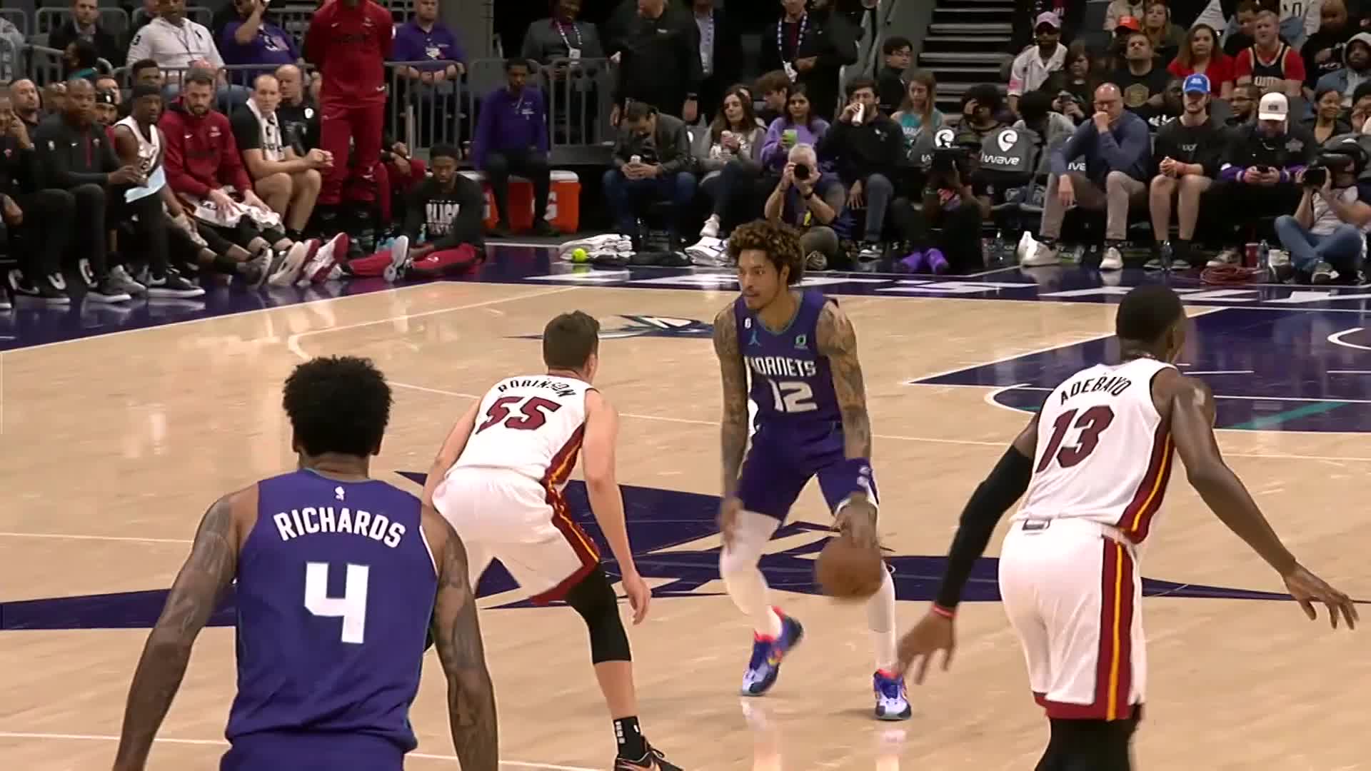 Kelly Oubre Jr. with an and one vs the Miami Heat
