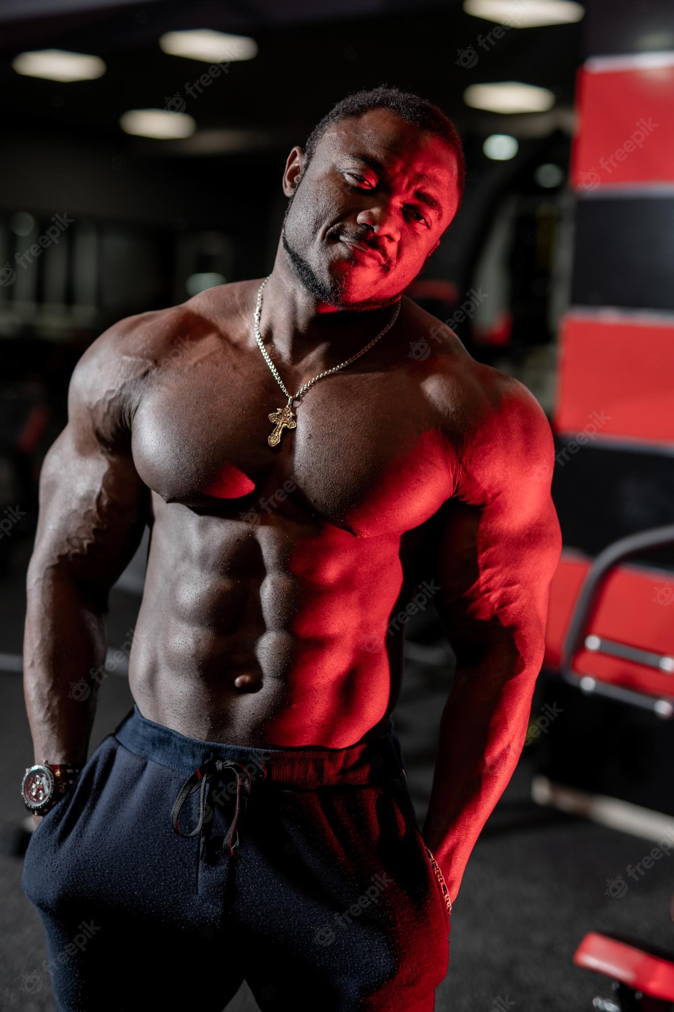 Premium Photo. Muscular man workout in gym strong male naked torso abs