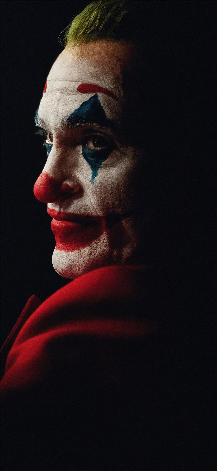 the joker joaquin phoenix dark 4k iPhone X Wallpaper Free Download