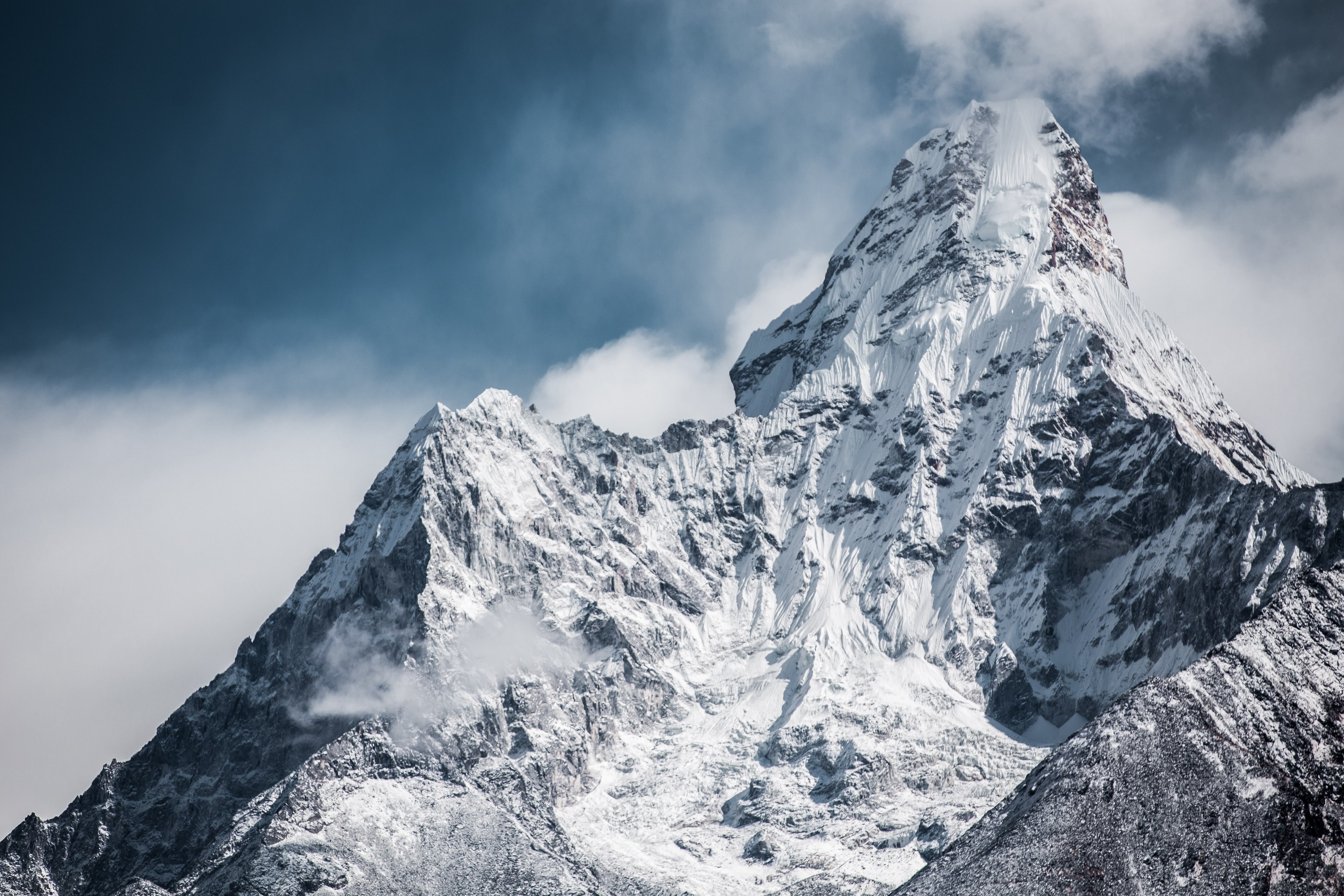 Wallpaper / view from mount everest base camp on the mighty summit, distant peaks 4k wallpaper free download